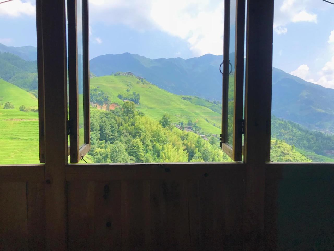 Dragon'S Den Hostel Longsheng Bagian luar foto